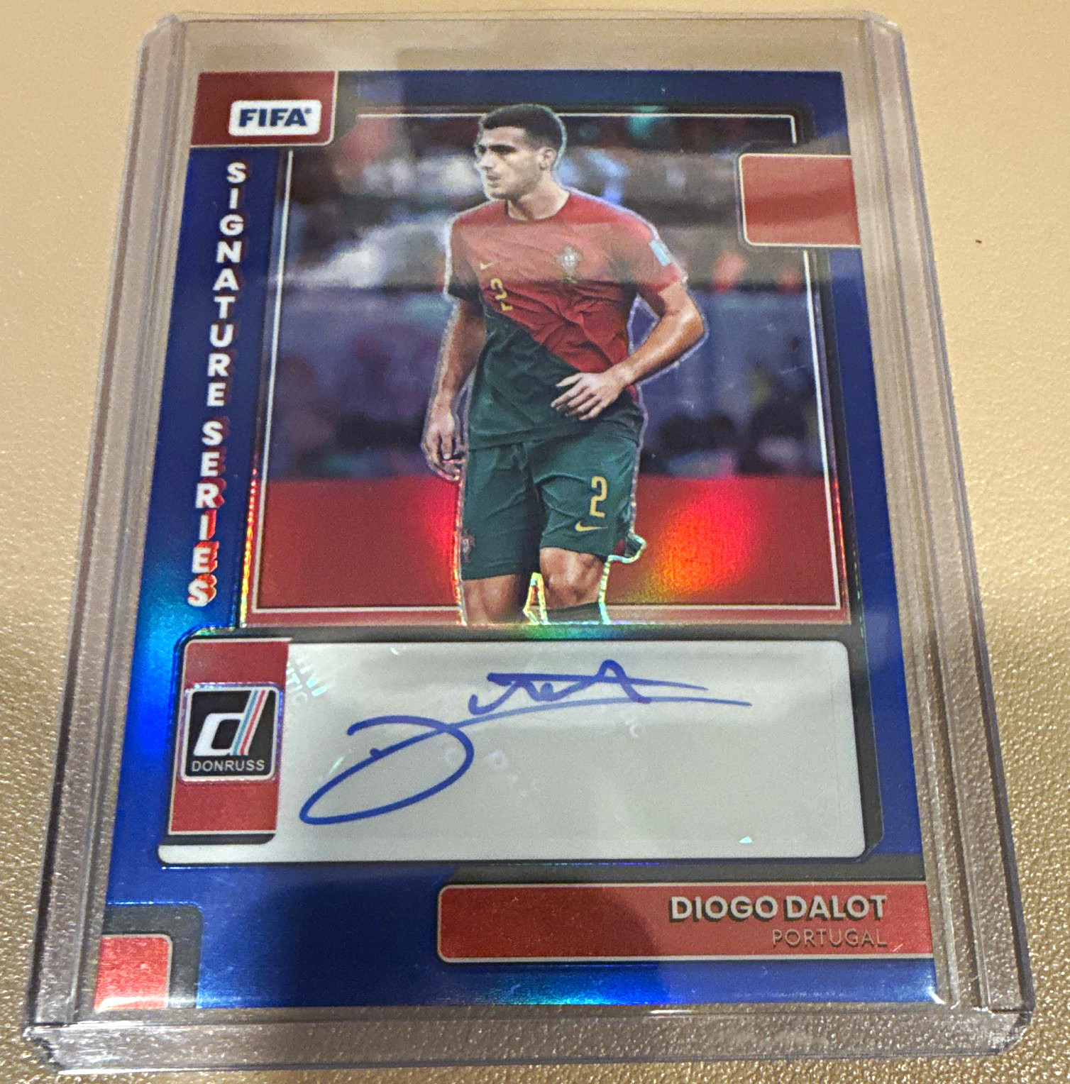 2022-23 Panini Donruss Diogo Dalot Portugal Signature Series Auto Blue /99 view 1