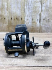 Daiwa SG27LC Fishing Reel with Line Counter Powermesh Drive Trolling Works EUC