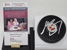 MIKAEL BACKLUND signed FLAMES puck JSA COA