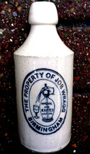 Beautiful All White Pictorial Ginger Beer Bottle. Very Good Clean Condition.