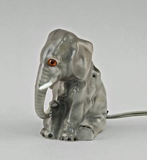 9340068 Rauchverzehrer sitzender Elefant H13cm