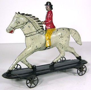 1870s AMERICAN TIN HORSE & RIDER ON PLATFORM FLOOR TOY By MERRIAM 9 INCHES LONG