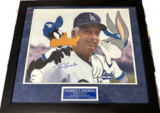 Framed Tommy Lasorda Autographed 16x20 Photo W/ Bugs Bunny & Daffy Duck PSA