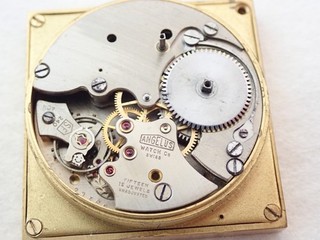 VINTAGE SWISS ANGELUS CALIBER SF 240 TRAVEL WATCH MOVEMENT PARTS
