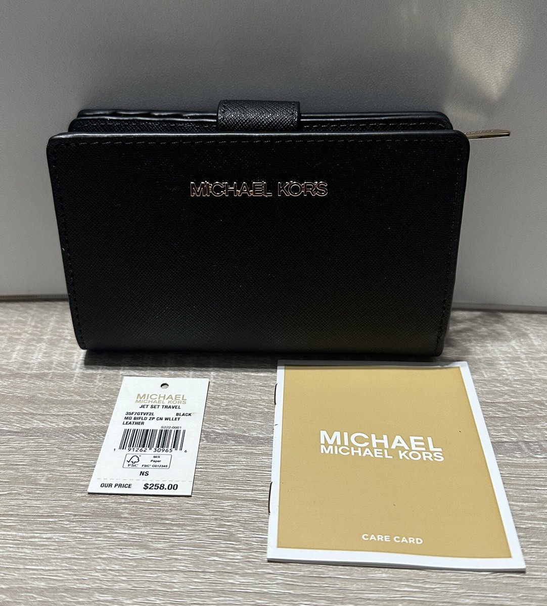 NWT MICHAEL KORS JET SET TRAVEL MD BIFLD ZP CN WALLET BLACK