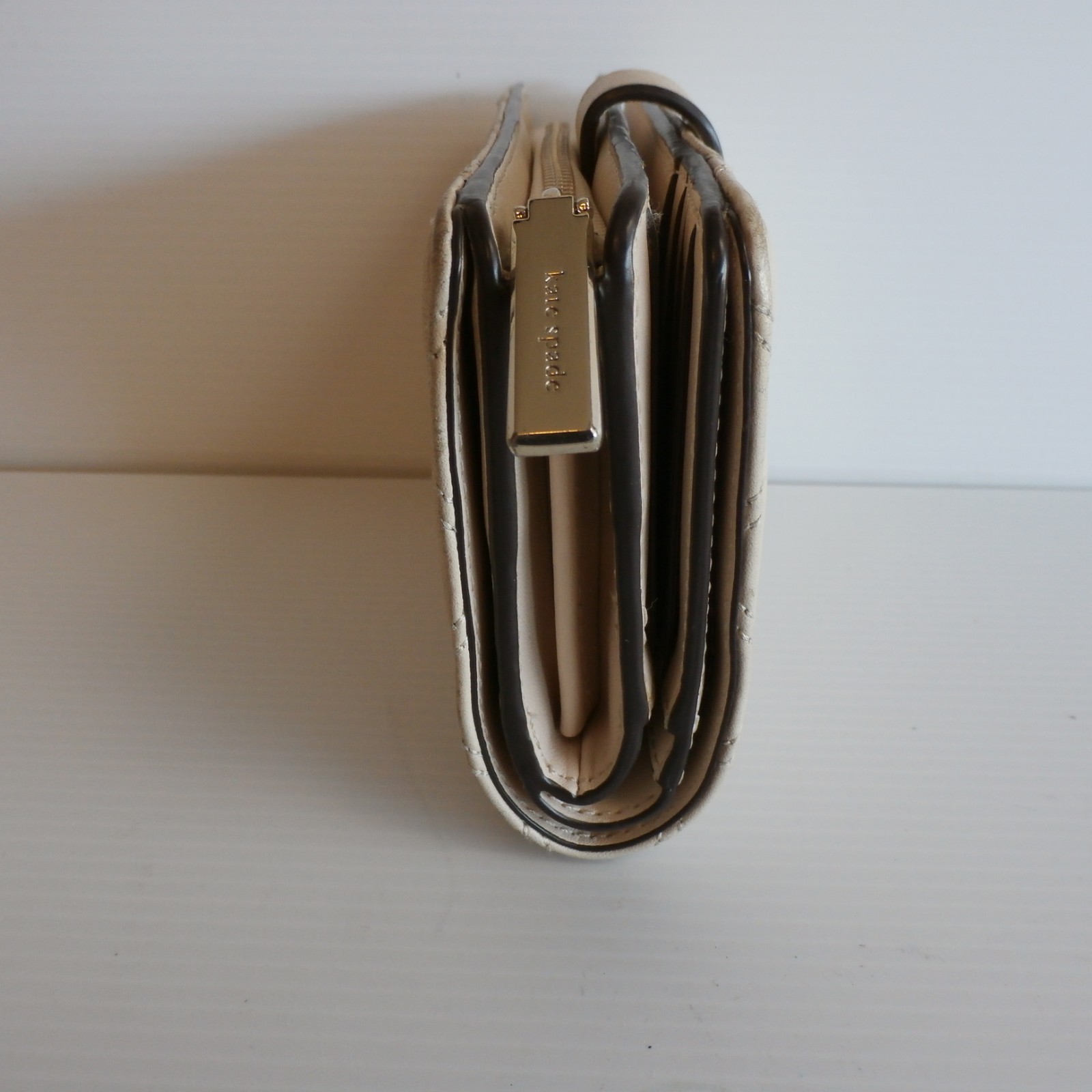 Kate Spade Carey medium wallet quilted beige leather bi-fold snap lock & zipper