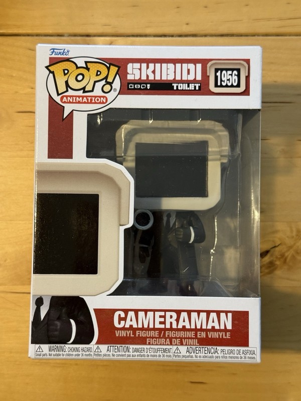 Funko Pop! Vinyl: Skibidi Toilet - Cameraman #1956 with Pop Protector