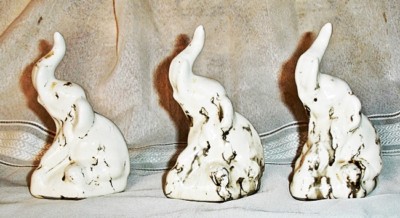 ELEFANTES. TRES FIGURAS TROMPA ARRIBA