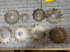 7 Shaper Cutting Blades six are 4-1/2" x 1" hole, One is 3-1/2" x 1-1/8" Hole