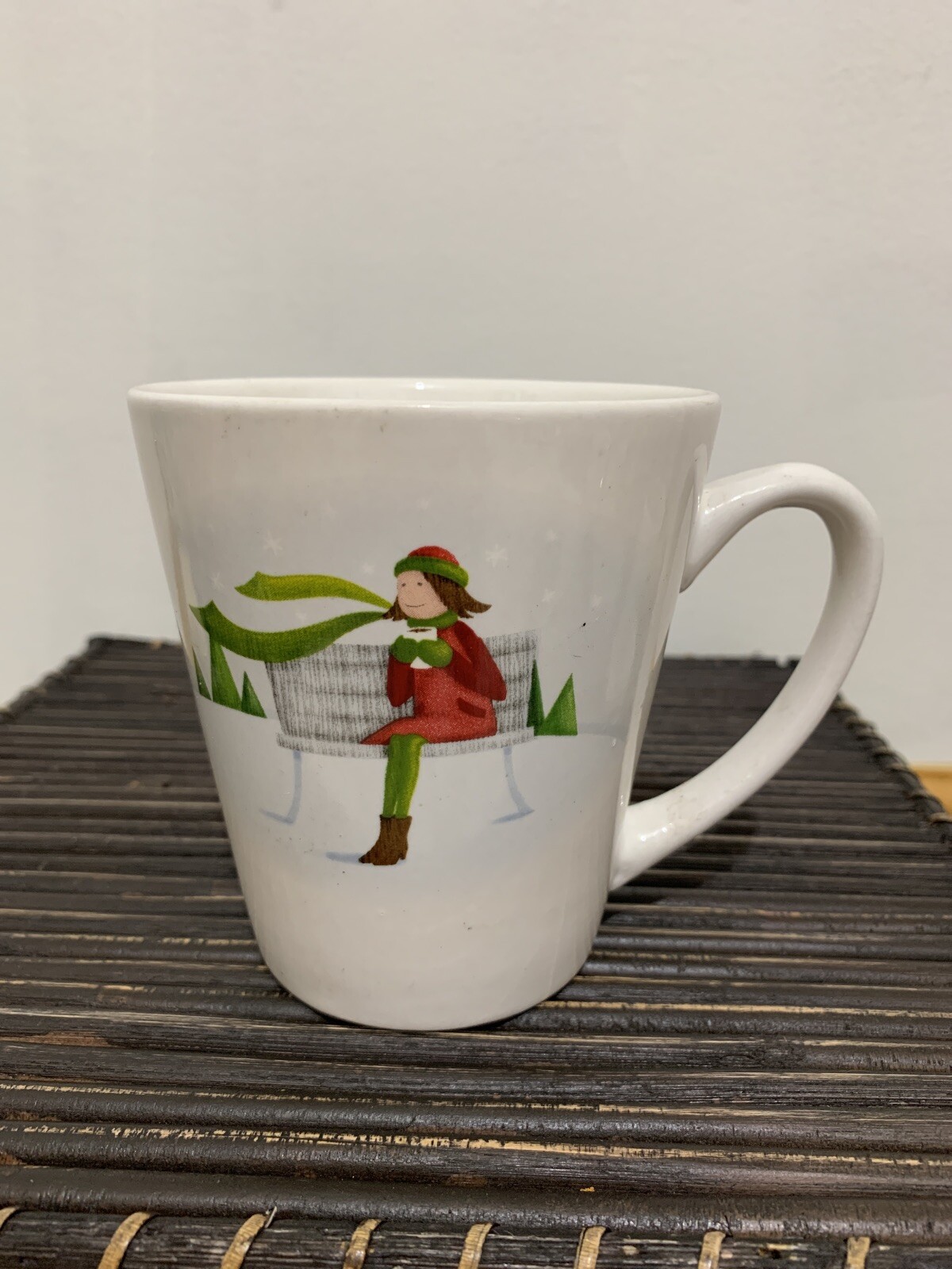 Produced For Designpac INC, coffee mug, winter scene girl on bench eBay