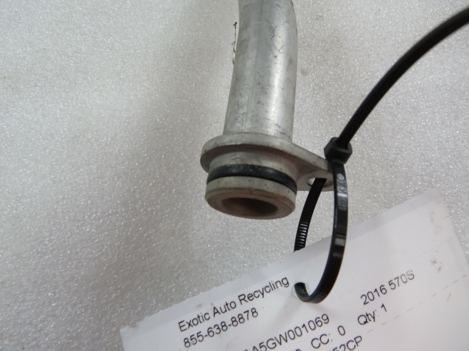 McLaren 570S, Transmission Water Line, Used, P/N 13G0052CP