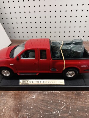 Mira Red Ford F-150 Pickup 1998, 1:18 scale With Plastic Barrels