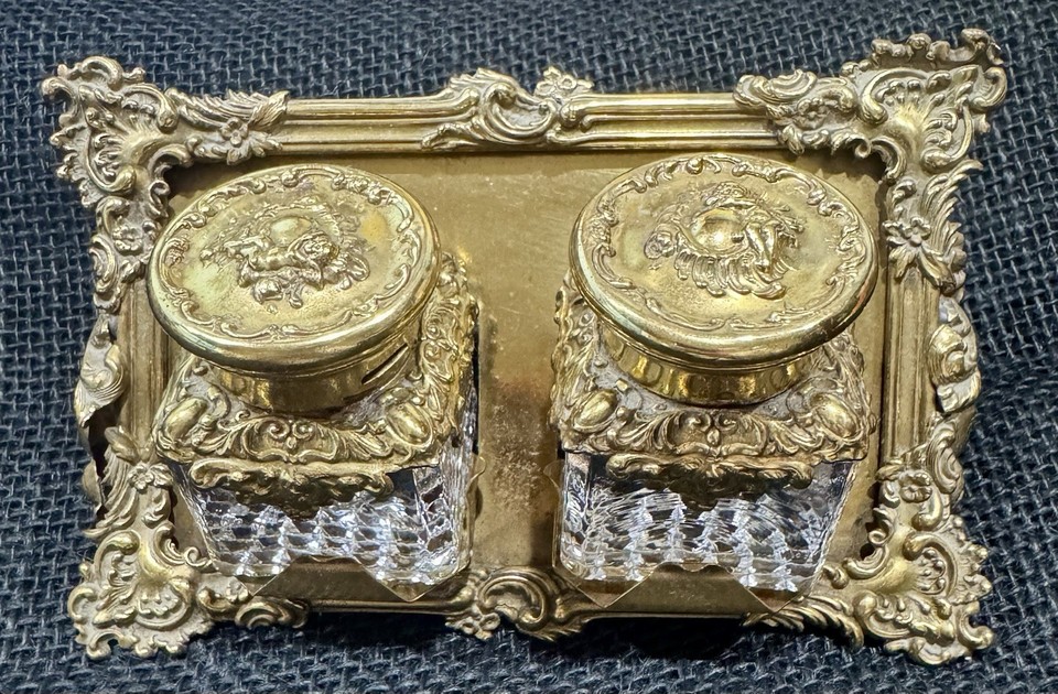 A rare double-well Art Nouveau/Victorian brass and glass inkwell on a stand — an antique that's genuinely hard to find and visually stunning enough to stop a room.