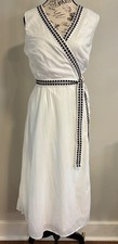 Ann Taylor sleeveless wrap dress in white w/black embroidered trim. Size 4
