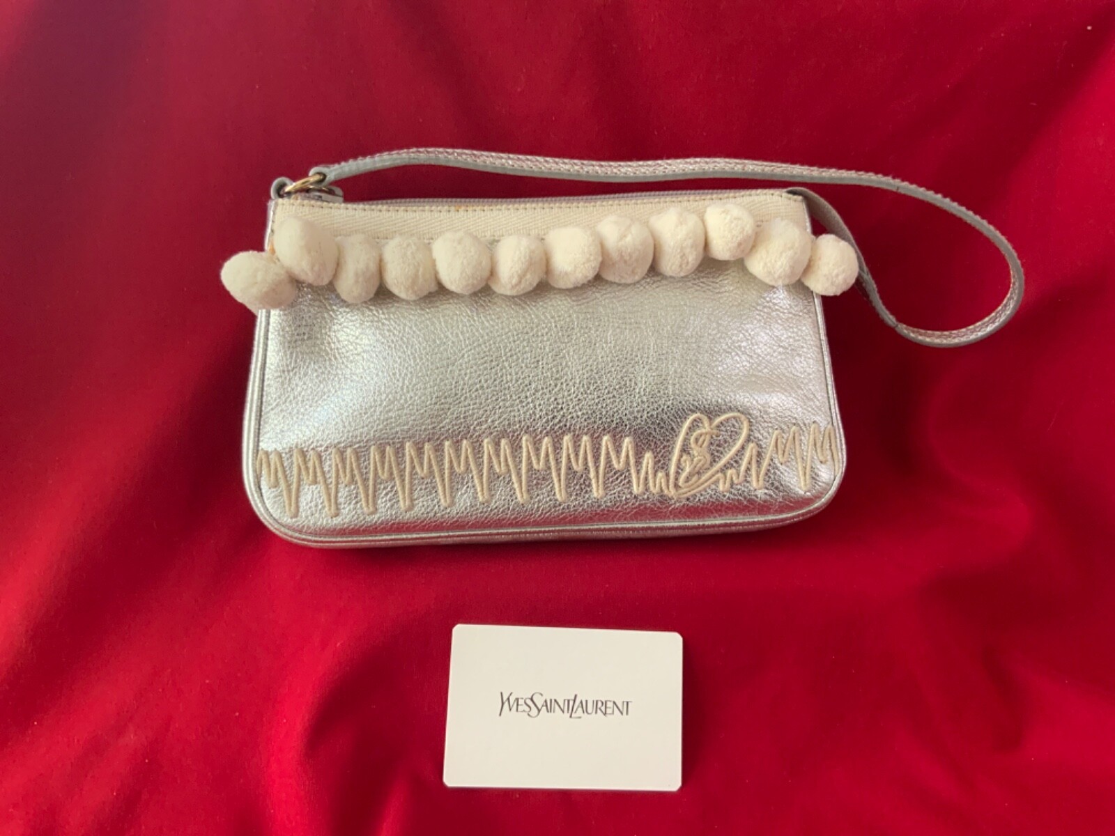 AUTENTICA ? BORSA YVES SAINT LAURENT IN PELLE ARGENTO BORSA CON APPLICAZIONI LOGO YSL?