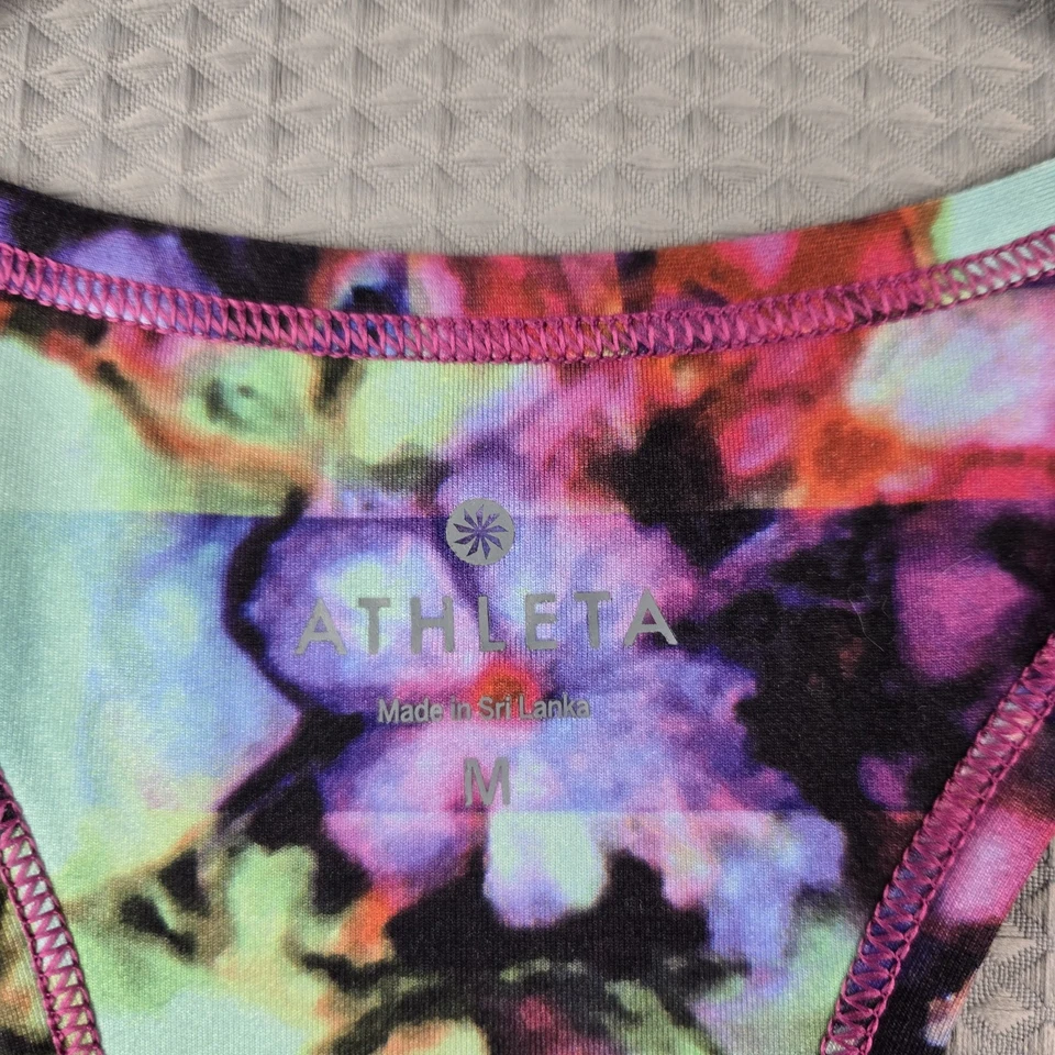 Camiseta sin mangas atlética Athleta para mujer floral colorida púrpura elástica espalda deportiva talla M Foto 3 de 4