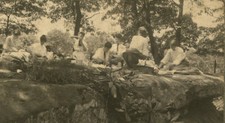 YOUNG COUPLES PICNICKING ON ROCK CLIFFS. SILVER PRINT. 1900. 
