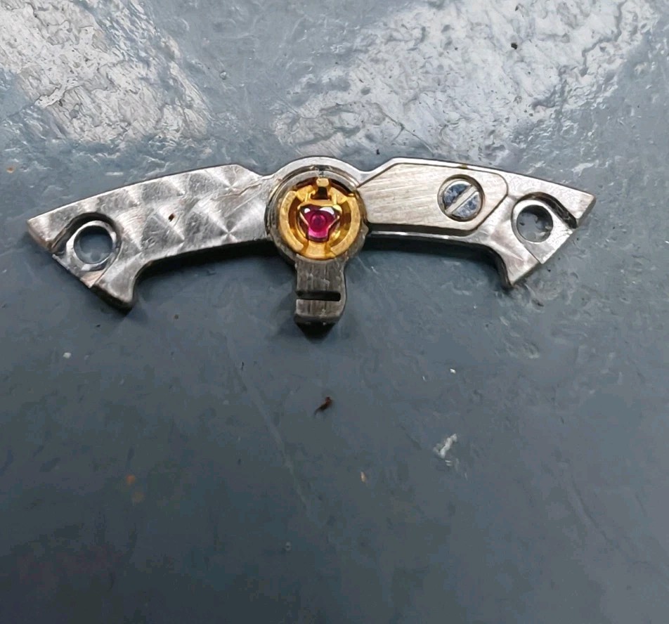 Rolex watch part 3135-120 Balance bridge Part with Jewel missing