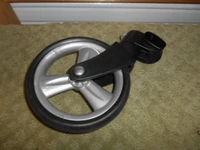 Front wheel for Peg Perego Vela Stroller. Size 6 5/8"   FITS RIGHT FRONT ONLY