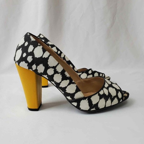 black white and yellow heels