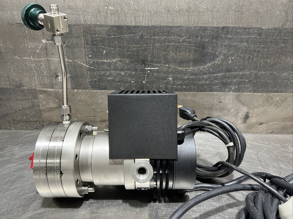 LEYBOLD TURBOVAC 50 85401 1200HZ TURBO VACUUM PUMP. Used LEYBOLD TURBOVAC 50 85401 1200HZ TURBO VACUUM PUMP. Used
