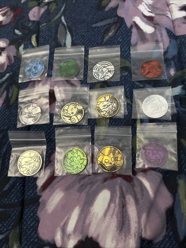 Lot of 12 Official Pokemon TCG Coins