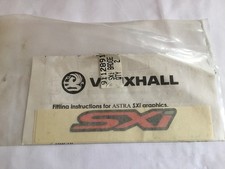 VAUXHALL ASTRA SXI decals. One pair.   New.   Genuine. 91128918.  Possibly 1990s
