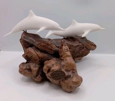 John Perry Carved White Dolphins on Burlwood Carved Pellucida Resin Table Decor