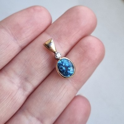 Anhänger 9 kt Gelbgold gepunzt Zargenfassung Blautopas 2 g gebraucht