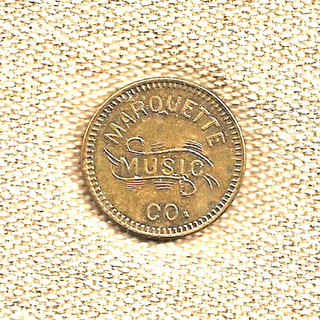 c1920s DETROIT MICH. GILT BRASS TOKEN MARQUETTE MUSIC CO. JUKE BOX OPERATOR