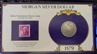 1879 Morgan Silver Dollar and Commemorative Stamp