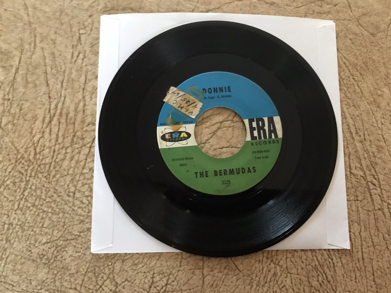 THE BERMUDAS     45 SINGLE ,  DONNIE  /   CHU  SEN  LING  1964 ERA