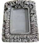 Silver Color With A Rose And Ruffled Themed Border.  Picture Frame 3.5 x 5