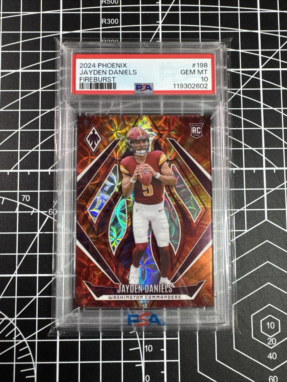 2024 Panini Phoenix - Rookies Jayden Daniels #198 Fire Burst /350 PSA 10