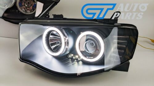 Black LED Angel Eyes Projector Headlights for 2006-2015 Mitsubishi Triton ute - Picture 1 of 12