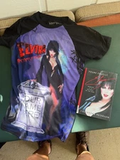 elvira  collector shirt with her on it and book . Halloween  item