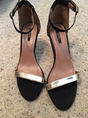 black and gold sandal heels