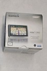  NEW In Box Garmin nüvi 1300 Automotive Mountable.  Utra Thin GPS  Navigator. — photo 1