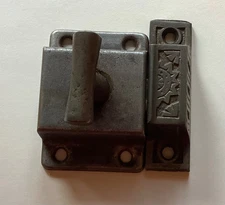vintage window latch with a T- handle made by National Manufacturing Company.