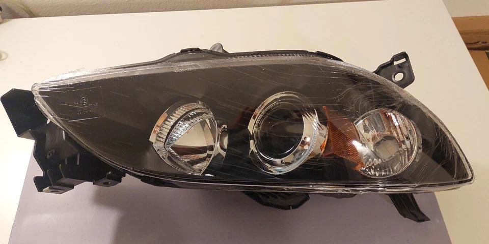 Conjunto de faros derecho Dorman 1591070 para Mazda 3 2004-2009 Foto 3 de 4