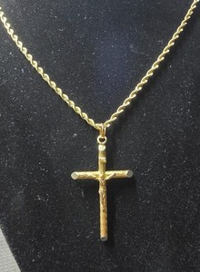 14 karat solid gold textured surface crucifix pendant on a 14 karat chain (N9SZ)