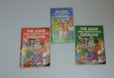 The Atari Video Computer System Catalog lot of 3: 1980 Blue, 1981 Green Orange