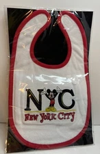 DISNEY NEW YORK CITY MICKEY MOUSE BABY BIB, WORLD OF DISNEY. NEW IN PACKAGE.