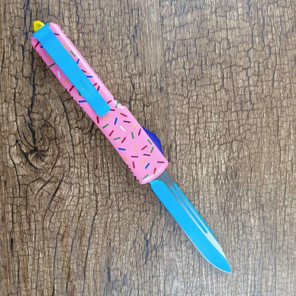 Cuchillo UT Donut 440 hoja satinada mango de aluminio rosa para camping al aire libre Foto 2 de 4