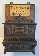 Piano électrique monnayeur Art forain fonte de fer rare centimes limonaire