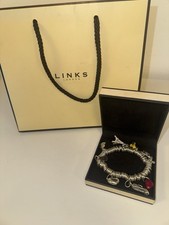 Authentic Links of London Sterling Silver Sweetie Bracelet + 8 Charms - 83g.
