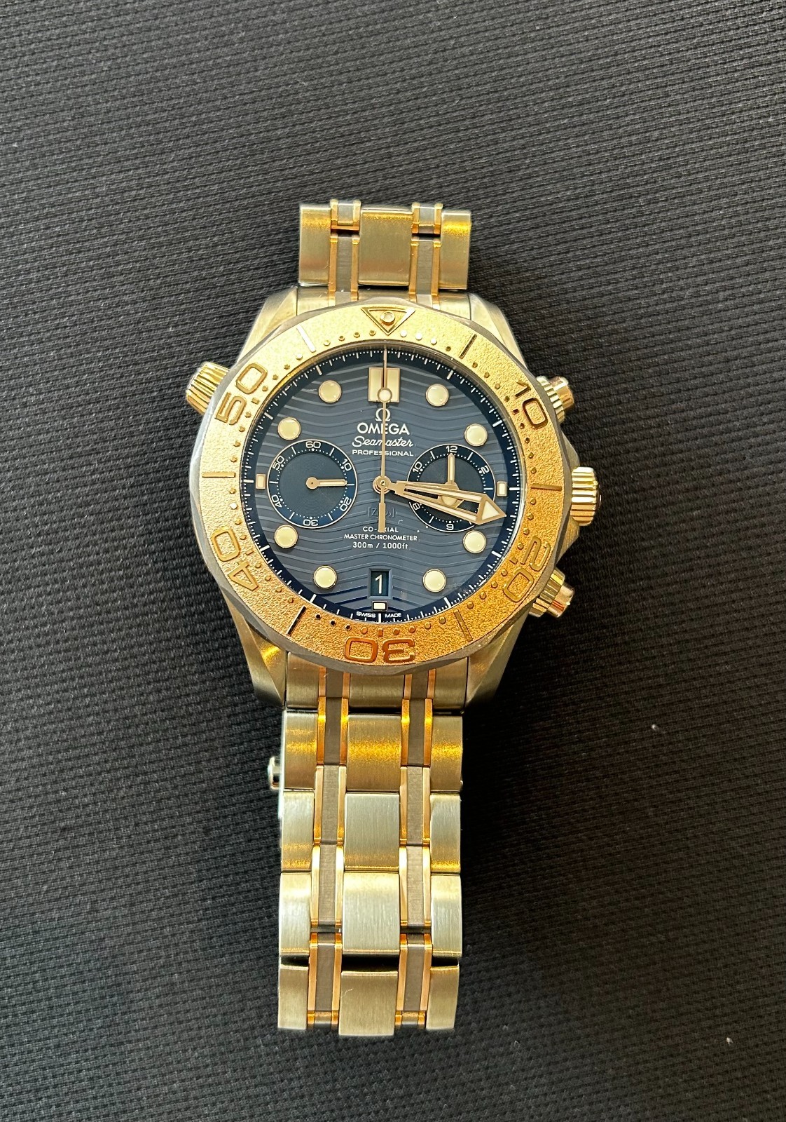Omega seamaster diver titanium Sedna gold