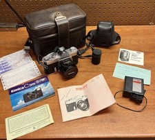 Konica Auto Reflex T 35mm SLR w/ Hexanon 52mm f1.8, Case, Flash, Manuals Lot