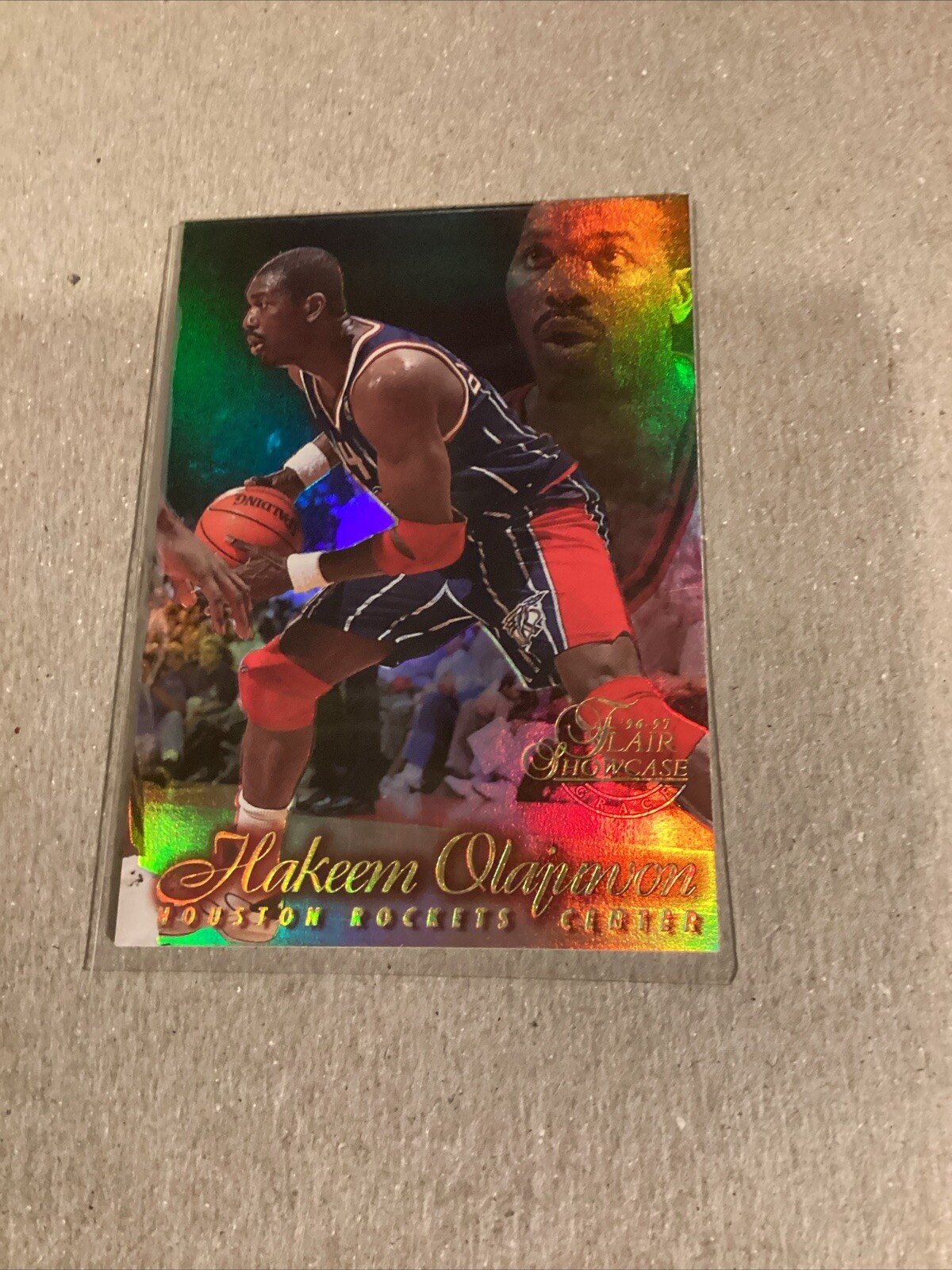 1996-97 Flair Showcase HAKEEM OLAJUWON Row 1 #14 Rockets HOF