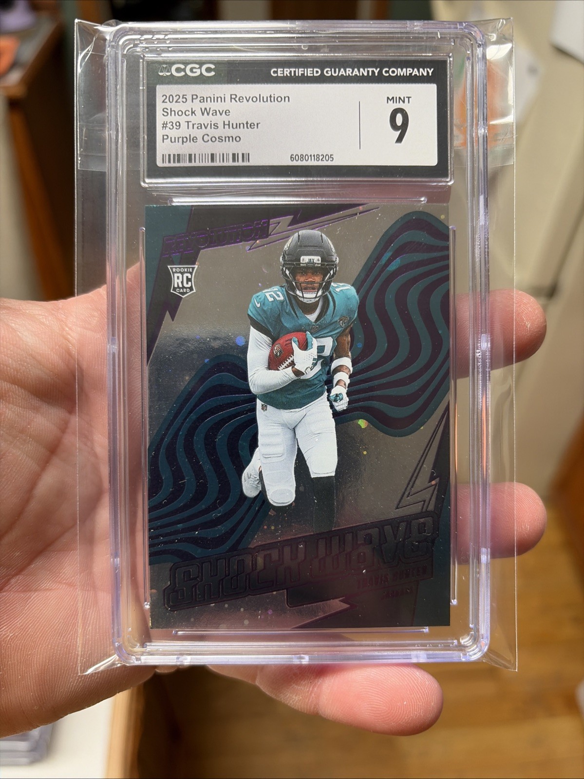 2025 Panini Revolution Shock Wave #39 Travis Hunter Purple Cosmo 08/10